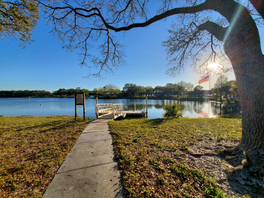 Freedom Lake Park also known as Mayor's Park at Freedom Lake in Pinellas Park Florida featuring scenic lake views, walking trails, green space, fishing areas, and outdoor recreation in Pinellas County.